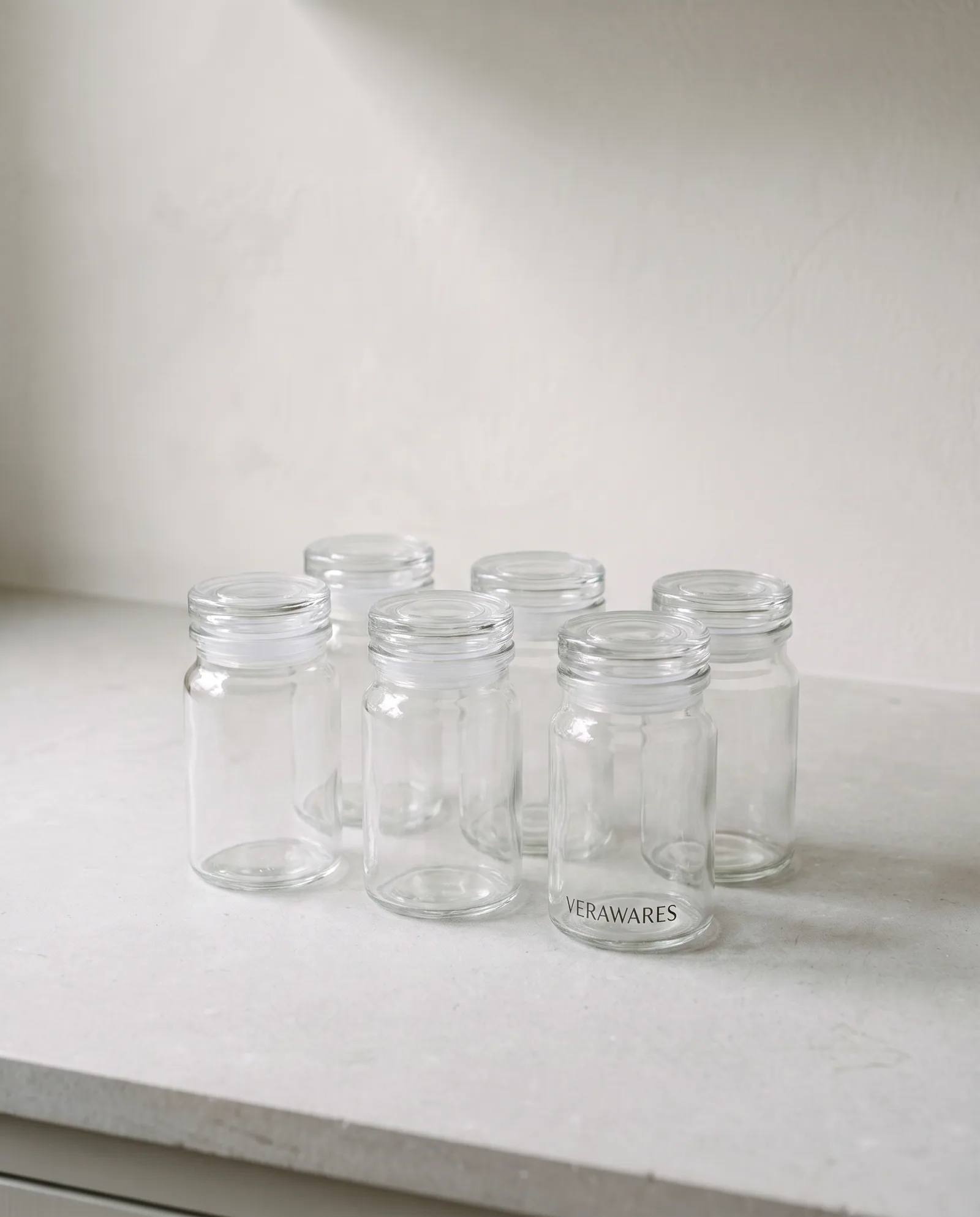 Spice Jars, Set of Six — Six glass spice jars with sealing lids